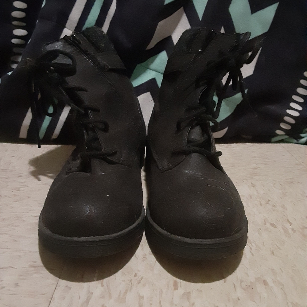 Black zip up boots.